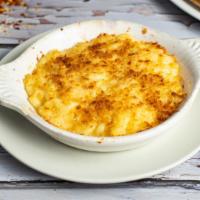 Cheesatarian (Mac & Cheese) · Elbow pasta cooked in a blend of creamy cheeses and baked with a Parmesan topping.