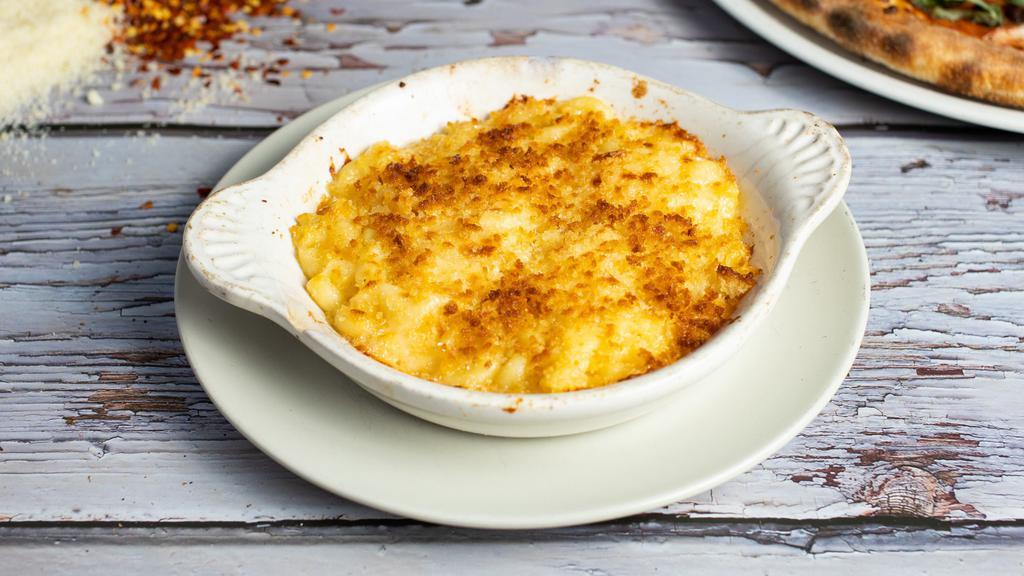 Cheesatarian (Mac & Cheese) · Elbow pasta cooked in a blend of creamy cheeses and baked with a Parmesan topping.