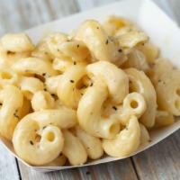 Mac And Cheese · Cavatappi mixed with our 3 cheese blend creamy sauce!