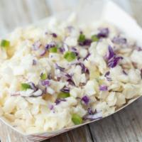 Slaw · Creamy Cole Slaw with our house-made dressing.