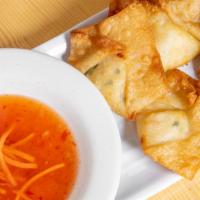Crab Rangoon (6) · Six pieces, fried cream cheese crab wontons with sweet and sour sauce.