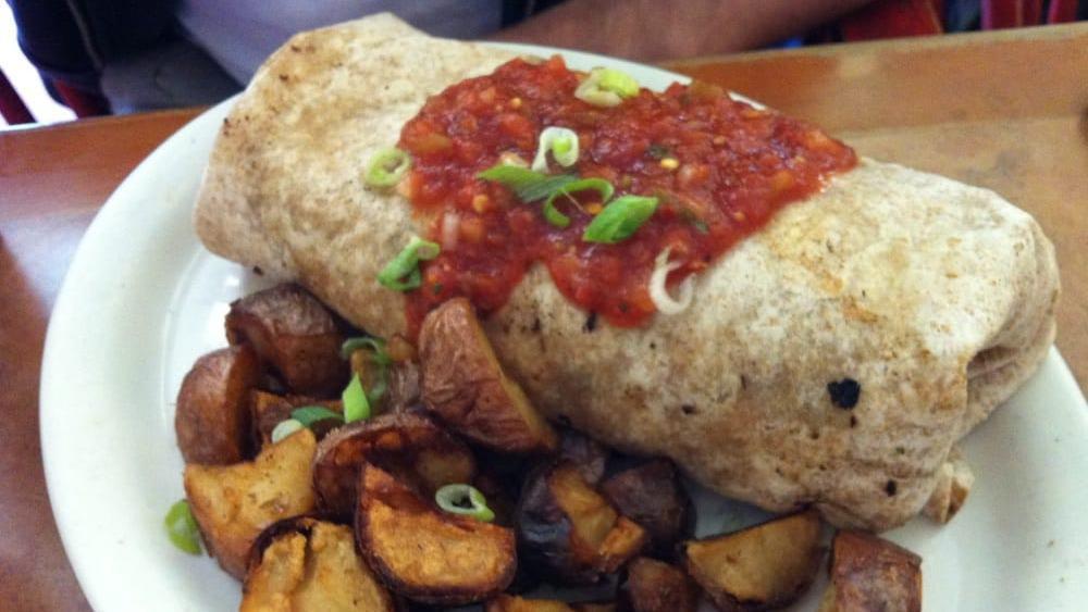 Burrito · Tofu, potatoes, black bean chili, sour cream and salsa in a wheat tortilla.