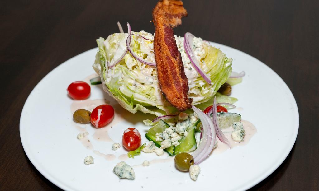 Wedge Salad · iceberg, crumbled gorgonzola, bacon, tomatoes, cucumber, olives, red onion, gorgonzola vinaigrette
