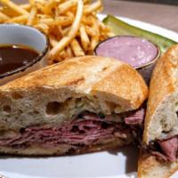 Prime French Dip* · 1430-1090 cal. Sharp white cheddar, toasted parmesan baguette, au jus.
