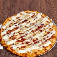 Small Chicken Bacon Ranch Pizza · Garlic Parmesan Sauce, Grilled Chicken, Chopped Bacon and Ranch Dressing.