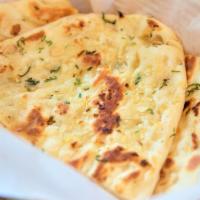 Aahaar Naan (Nf) · Tandoor cooked flatbread.