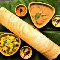 Agraharam Masala Dosa · Lentil rice crepe with potato masala filling. Served with chutney and sambar.