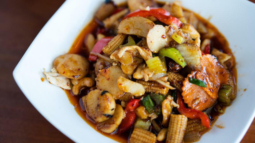 Cashew Delight · Cashew nut stir fry with chili jam, carrot, baby corn, onion, water chestnut, and red bell pepper.