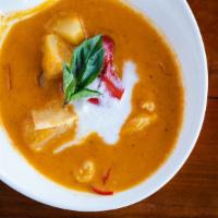 Pineapple Curry · Pineapple in classic red curry, red bell pepper, and basil.