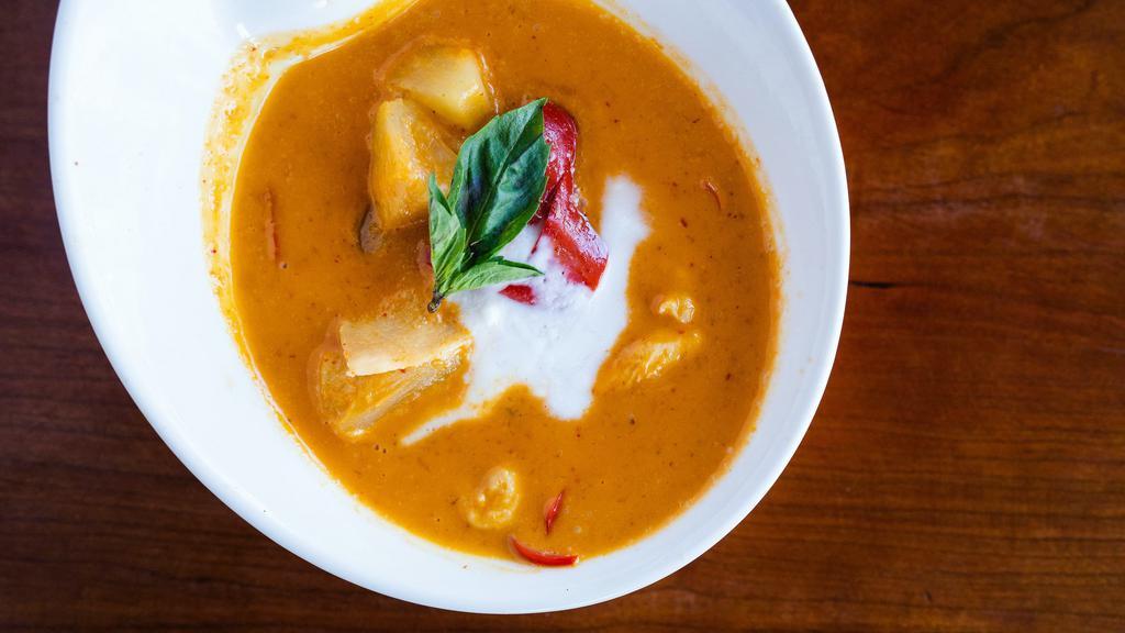 Pineapple Curry · Pineapple in classic red curry, red bell pepper, and basil.