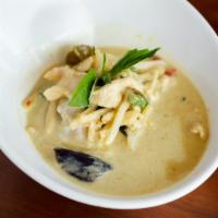 Coconut Meat Curry · Fresh young coconut meat, eggplant, red bell pepper, green bean, and basil in a classic gree...