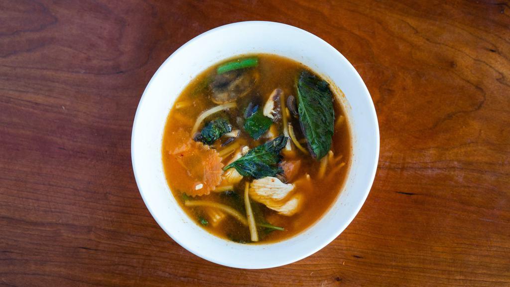 Jungle Curry · Spicy non-coconut milk, bamboo shoot, tomato, green bean, carrot, baby corn, onion, eggplant, red bell pepper, tomato, Thai pickle rhizome, rice powder, and black and white mushroom.