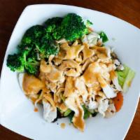 Pra Ram · Streamed broccoli, carrots, baby corn, cabbage, and mushroom topped with peanut sauce and ch...