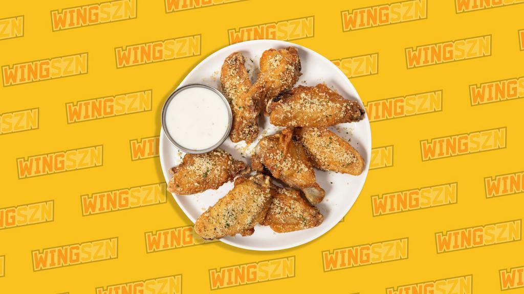 Crispy Garlic Parmesan · The ultimate crowd pleaser. Savory garlic, rich cheesy parmesan, a touch of kosher salt, tossed with our classic, bone-in chicken wings. This dry rub hits different.
