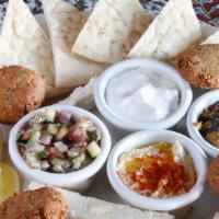 Mazeh Plate · Dolmas, feta cheese, kalamata olives, falafel, shirazi salad, tzatziki, kashk o’ bademjoon, ...