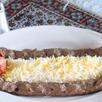 Chelo Kebab Koobideh · Marinated organic ground beef or chicken broiled over an open fire.