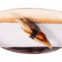 Nigiri Unagi. · freshwater eel, house eel sauce, sansho pepper