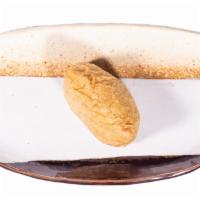 Nigiri Inari · house marinated tofu pouch