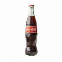 Coca Cola · (12oz Bottle)