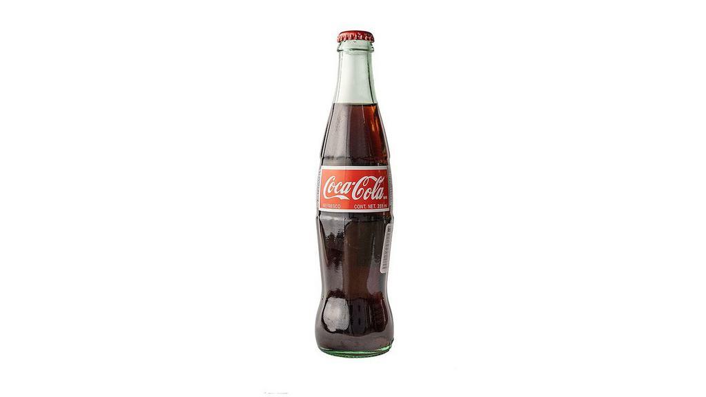 Coca Cola · (12oz Bottle)