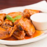 Spicy Buffalo Wings · Served with ranch or Bleu Cheese Dressing