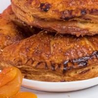Sweet Apricot & Rhubarb Hand Pie · Rich and mildly tart apricot and rhubarb filling inside a flaky pie crust.