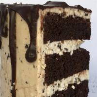 Vegan Stracciatella Cake Slice · Devil's Food cake layered with with a “stracciatella” chip buttercream - like chocolate chip...