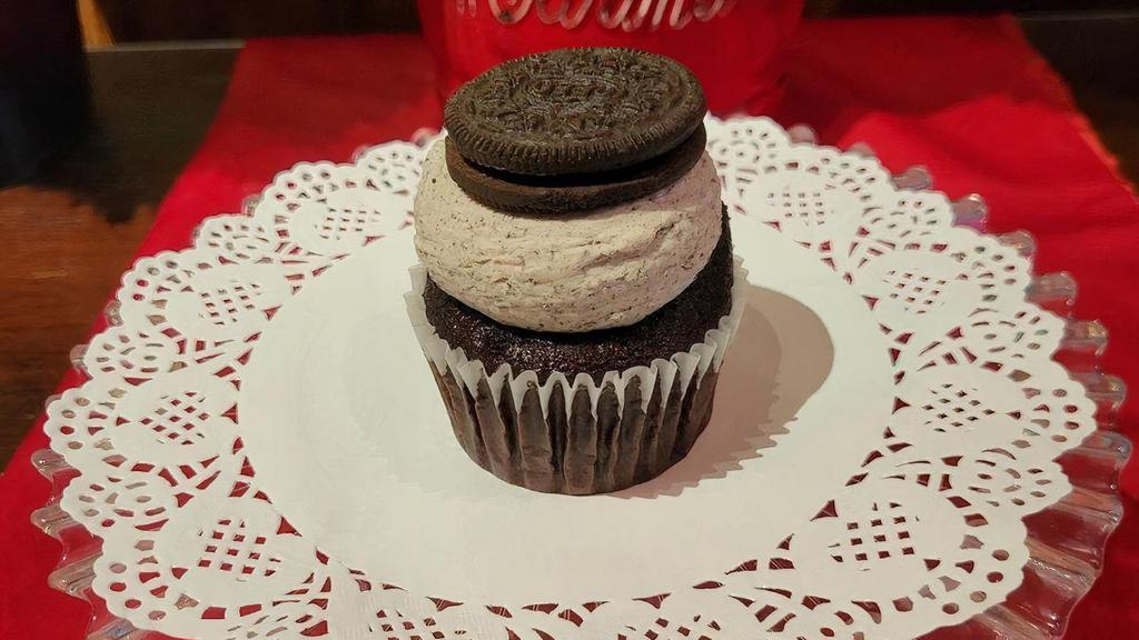 New!  Cookies And Cream Cupcake · Try this amazing new seasonal creation — a chocolate cupcake with chocolate filling, cookies and cream buttercream, with a chocolate sandwich cookie on top!