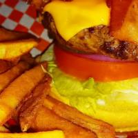 Bacon Cheeseburger Combo  · Half pound all beef burger flame grilled, topped with your choice of cheese and two slices o...