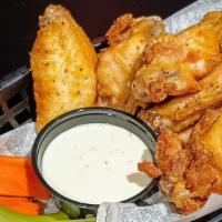 Buffalo Chicken Wings · Eight flats and drumettes tossed in our own Buffalo sauce.  Choose your heat level for the p...