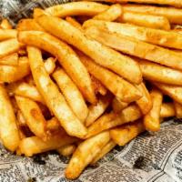 Basket Of Fries · Large portion of straight cut or curly fries with your choice of dipping sauce