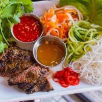Vietnamese Lettuce Wraps · A Plate consisting of Butter Lettuce, Pickled Daikon and Carrot, Shaved Cucumbers, Fresh Chi...