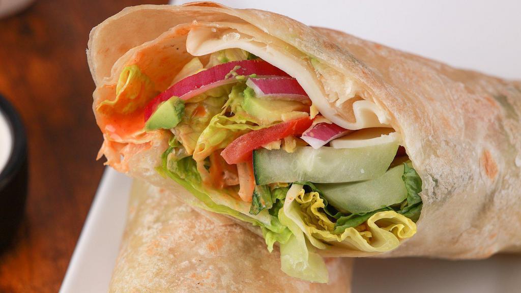 Veggie All The Way · Romaine lettuce, tomato, cucumber, red onion, avocado, provolone cheese and honey blazed dressing drizzle folded into a warm flour tortilla.