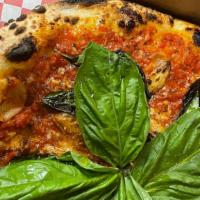 Md Marinara · Hand stretched dough, our signature red sauce, roasted garlic and basil.