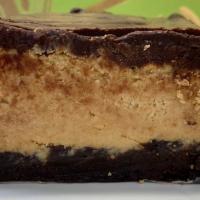Peanut Butter Brownie Bar · Layered bar with a brownie bottom, graham cracker peanut butter center, and topped with a ch...