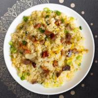Freaky Fried Rice · Rice stir-fried with your choice of meat, seefood, or tofu, peas, carrots, broccoli, onions,...