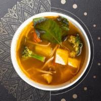 Veggie Soup · Non-spicy clear broth soup with tofu, carrots, Napa cabbage, baby corn, mushrooms, onion, ci...