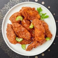Hot Spot Wings · Crispy chicken wings tossed with sweet & hot sauce.