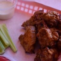 Chicken Wings · 14 ounces of our famous wings. Choose from Barbecue, Buffalo, Cajun, or Garlic Parmesan. Com...