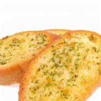 Garlic Bread · Four slices of garlic bread served with marinara.