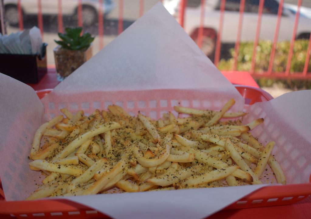 Garlic Seasoned Fries · A generous portion of our Fries seasoned with a special blend of garlic and seasoning
