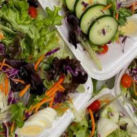 Fresh Garden Salad  · Our Larger size Garden Salad will feed one hungry customer as the main dish or two or more a...