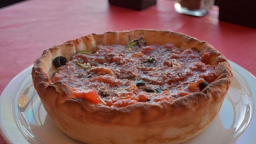 El Diablo True Chicago Pizza · Pepperoni, Jalapeno, Roasted Green Chile, and Hot Giardiniera.