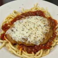 Chicken Parmesan Pasta · Our Spaghetti smothered in Marinara and topped with Italian Breaded Chicken Breast Chucks wi...