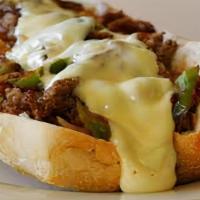 Philly Cheesesteak · Sliced Beef with Sauteed Bell Peppers and Onion topped with White American Cheese