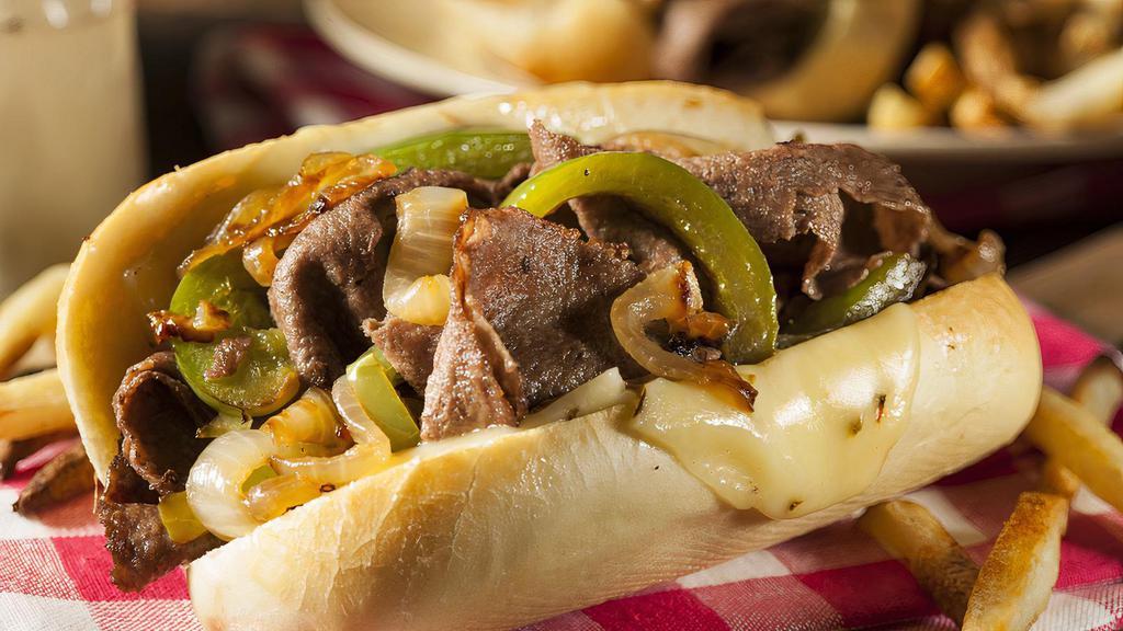 Italian Beef Sandwich · Italian Sliced Beef, Sauteed Bell Pepper & Onion, Choice of Hot or Mild Giardiniera, and Side of Au Jus.