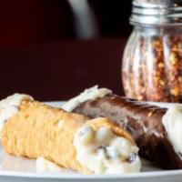 Chocolate Dipped Cannoli · Cannoli Dipped in Delectable Chocolate