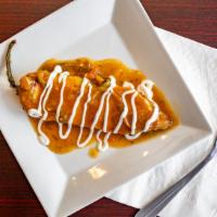 Chile Relleno Plate · Vegetarian. One chile relleno smothered with Coma's unique salsa rice, refried pinto beans o...