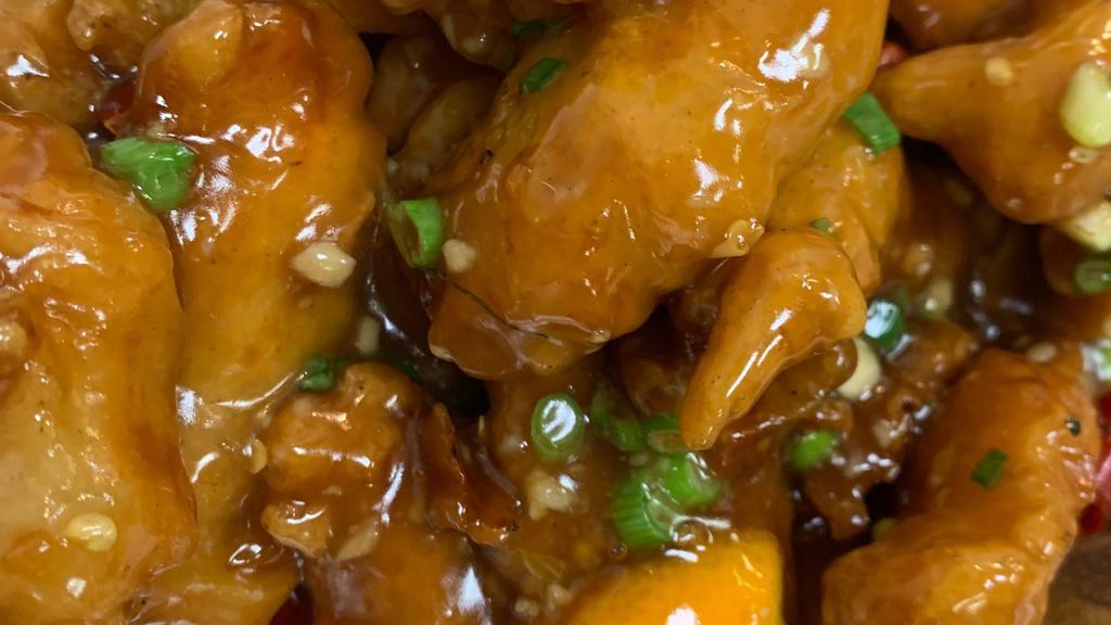 Orange Chicken · Crispy chicken sautéed with orange peel sauce.