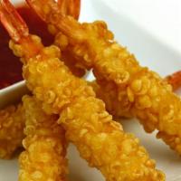 Shrimp Tempura · 3 pieces of shrimp with eel sauce and spicy mayo, tempura flakes on top
